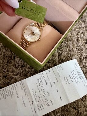 Gucci Women's Gold Tone Bracelet Watch with Champagne Dial